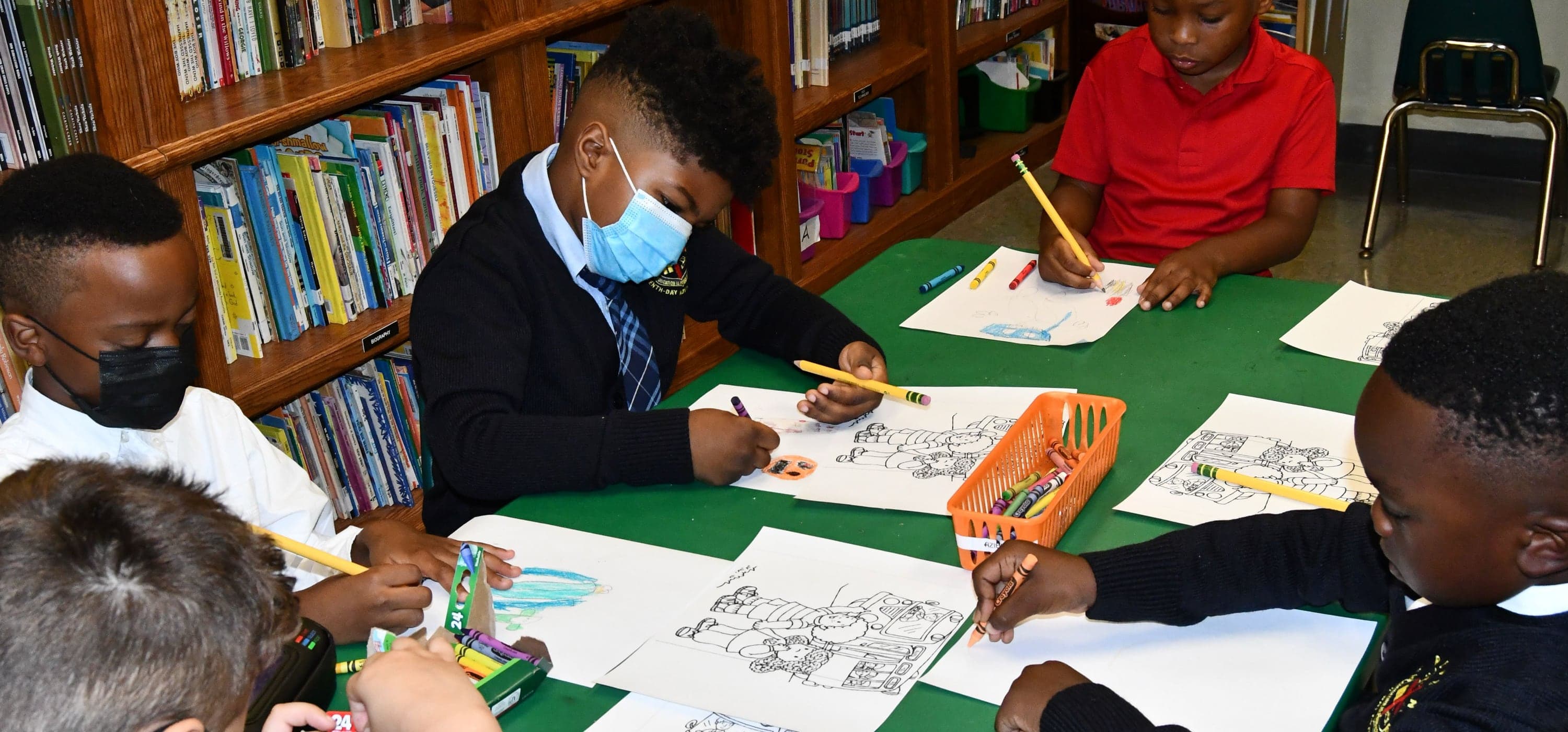 Students drawing in class at Perrine SDA School